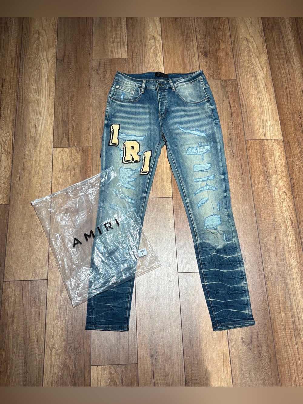 Amiri Mens Distressed Ripped Blue Jeans with White Logo Waist Size 32,34 NWT